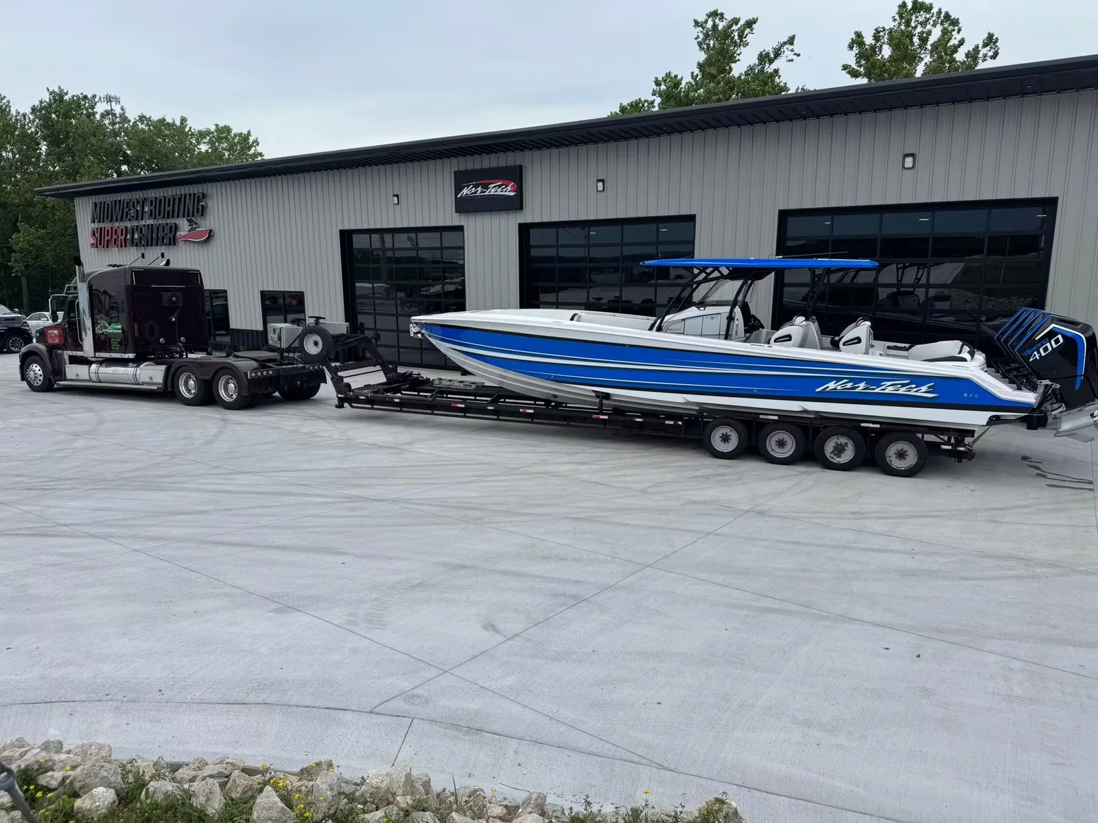 Xclusive Transport hauling vehicles on a Missouri run